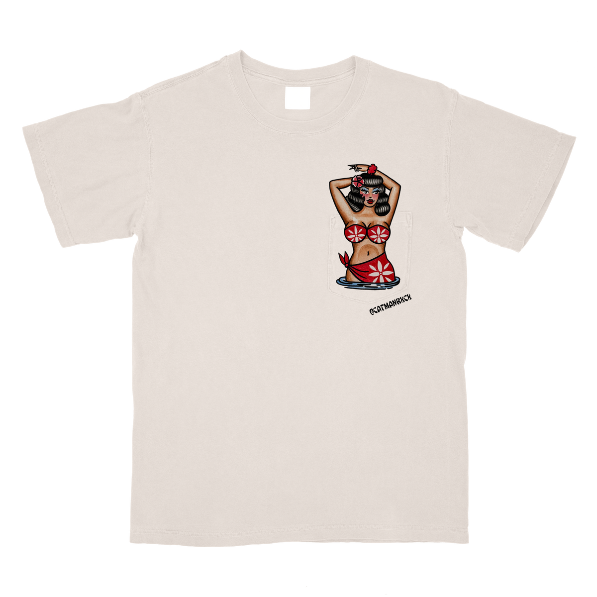 A light beige crewneck t-shirt featuring a graphic print of a hula dancer with a red and white floral lei, on a clean white background.